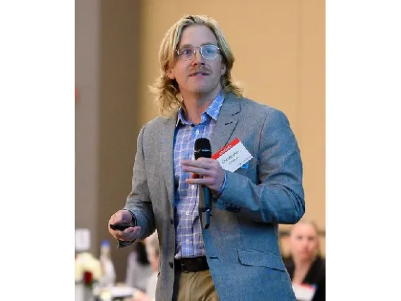 Chris Grayson giving a talk at the CoS Galileo Circle Dinner