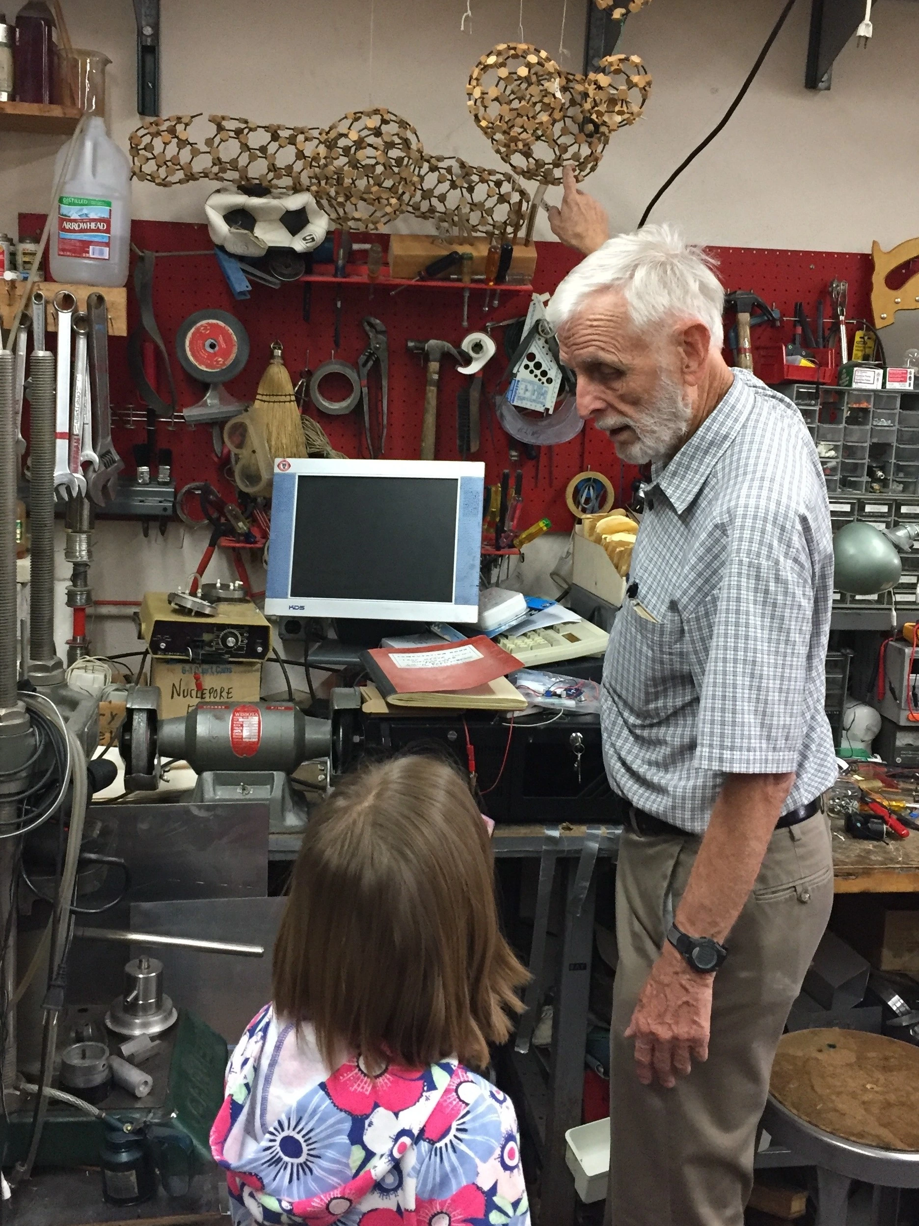 Donald Huffman in lab with child